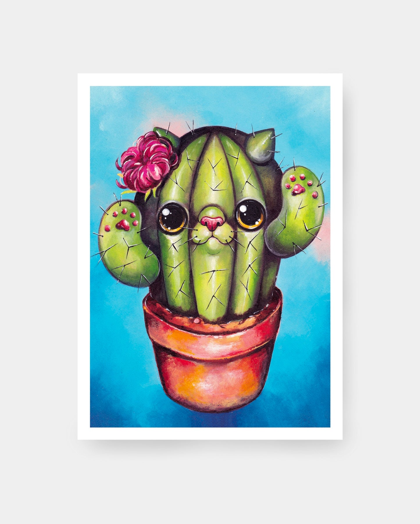 gatto cactus verde su sfondo azzurro con fiore