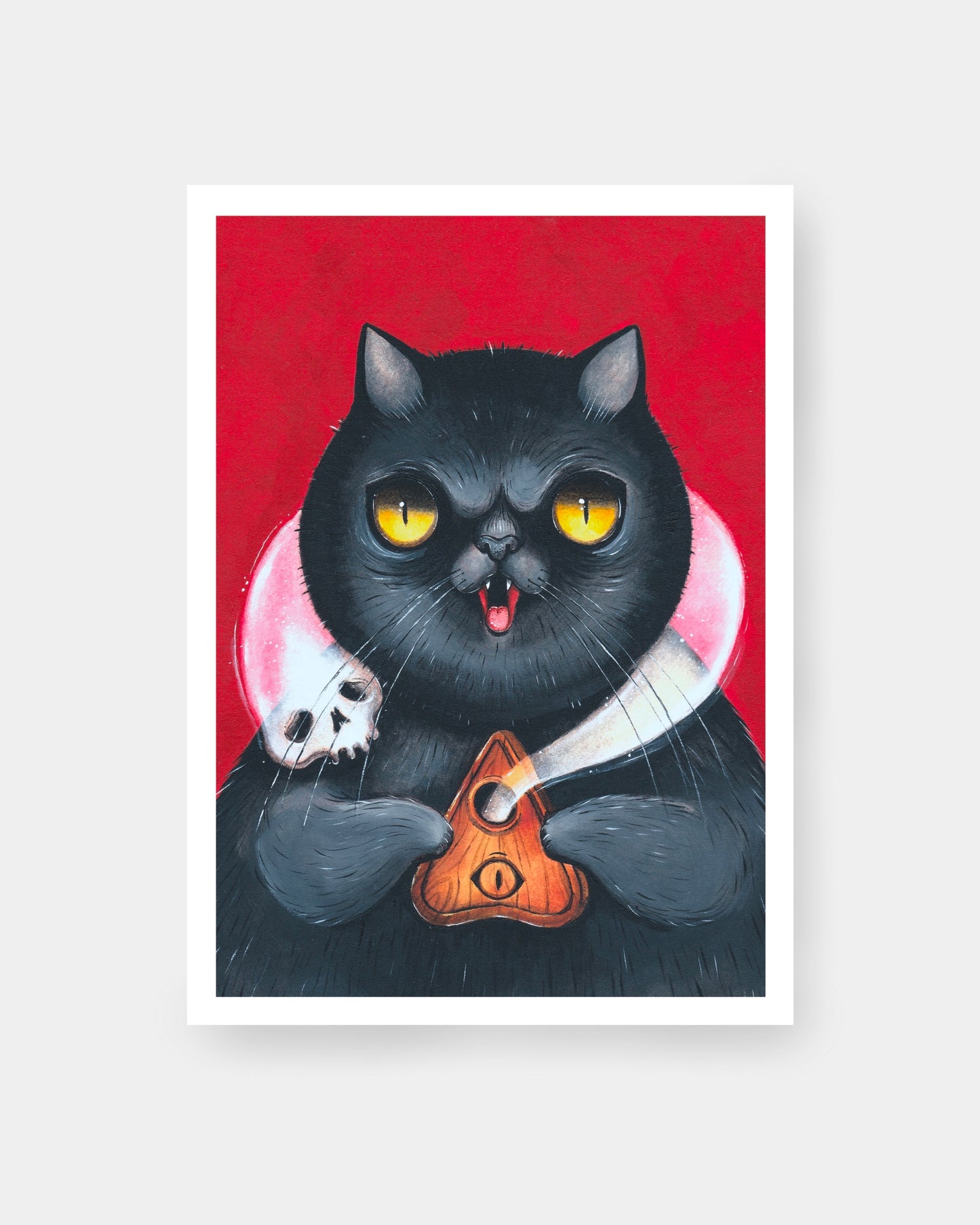 gatto nero con occhi gialli con planchette per tavola ouija